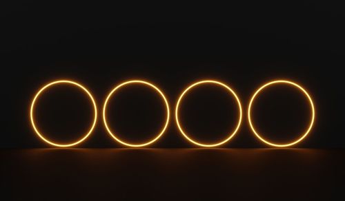 Close-up of illuminated lights at night