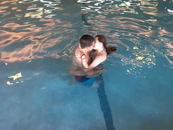 High angle view of man swimming in pool