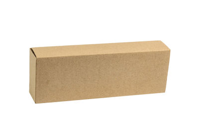 Low angle view of brick wall against white background