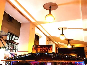 Low angle view of illuminated lights