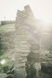 Stone wall against sky