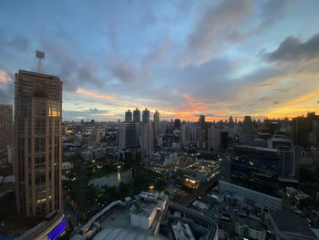 High angle view of buildings against sky during sunset