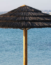 Close-up of beach umbrella on rainy day