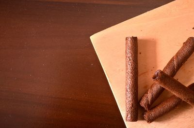 High angle view of cigarette on table