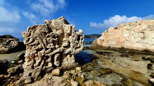 Panoramic view of rock formations against sky