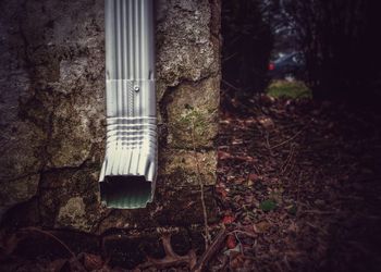 Close-up of exhaust pipe on wall