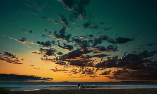 Scenic view of sea at sunset