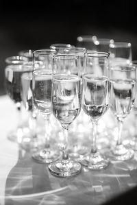 Close-up of wineglasses on table