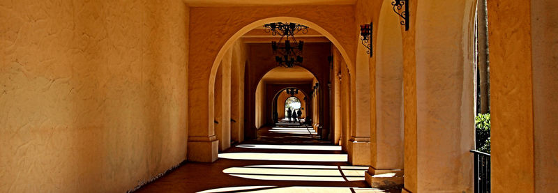 The colonnades provide a natural dimineshing perspective. balboa park, san diego, california.