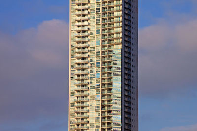 Low angle view of skyscraper against sky