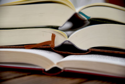 Close-up of books stacked on table