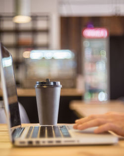 Close-up of coffee cup on table