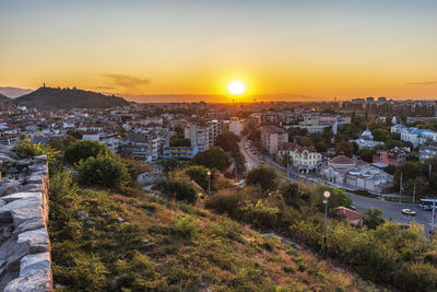 High angle view of townscape against sky during sunset