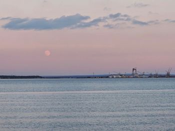 Scenic view of sea at sunset