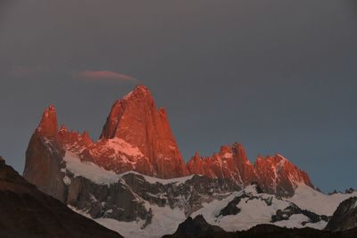 Scenic view of snowcapped mountains against sky during winter