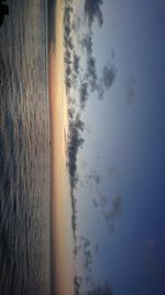 Scenic view of sea against sky at sunset