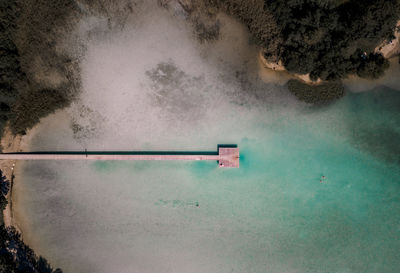 High angle view of swimming pool by sea