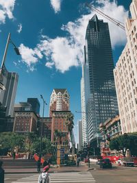 View of city buildings against sky