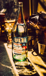 Close-up of glass bottles on table