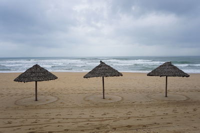 Scenic view of beach against sky