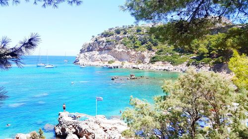 Scenic view of sea against blue sky