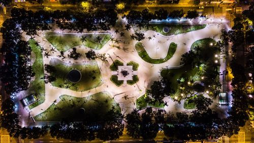 Full frame shot of fountain with trees in water