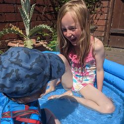 Portrait of smiling girl in swimming pool