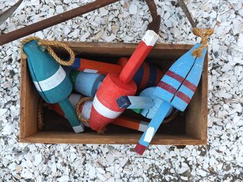 Directly above shot of buoys in container