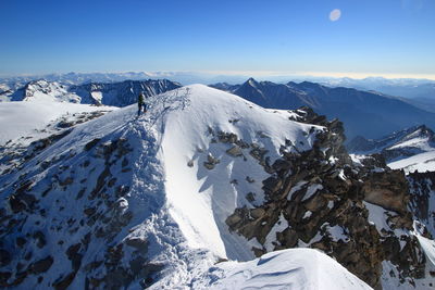 Snowcapped mountains against sky