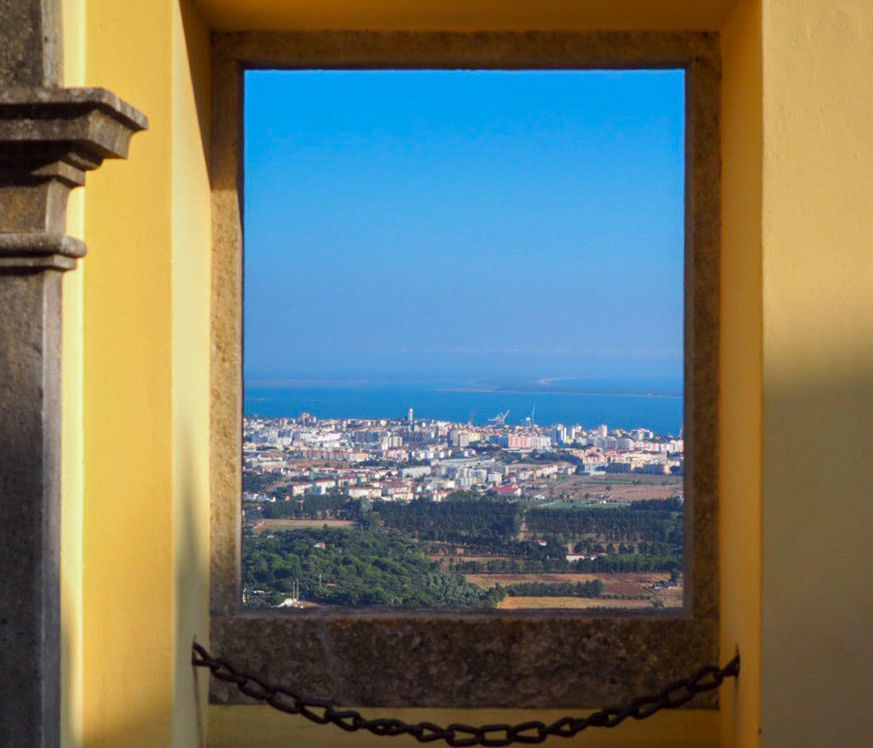 BUILDINGS SEEN THROUGH WINDOW