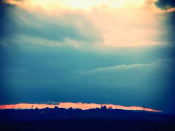 Scenic view of landscape against sky during sunset