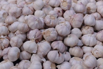 Full frame shot of onions for sale in market