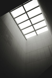 Low angle view of skylight in building