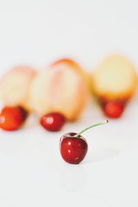 Close-up of strawberry over white background