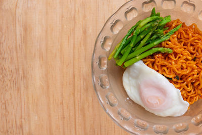 High angle view of chopped vegetables in bowl on table