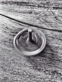 Close-up of metallic object on table