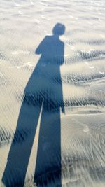 Shadow of man on wall