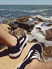 Low section of person on beach