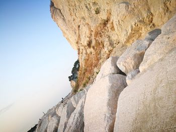 Scenic view of rock formations against sky