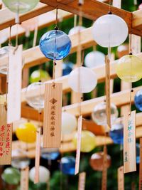 Close-up of lanterns hanging for sale