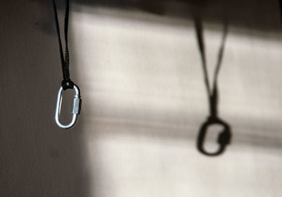 High angle view of chain hanging on metal