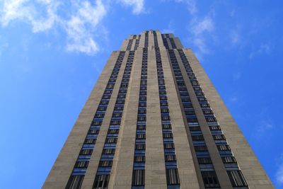 Low angle view of rockefeller centre against blue sky