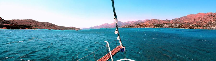 Scenic view of sea against blue sky