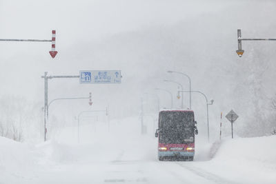 The bus run through the blizzard and bad visibility in hokkaido, japan