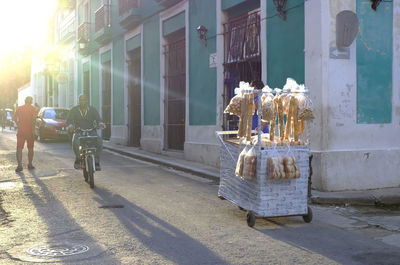 Panoramic view of city street on sunny day