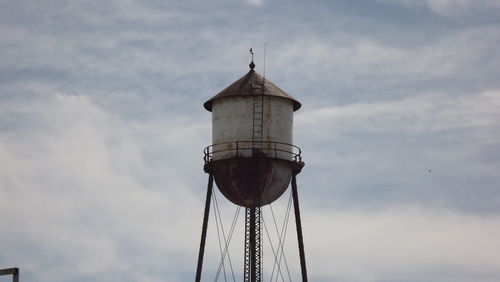 Low angle view of water tower against sky