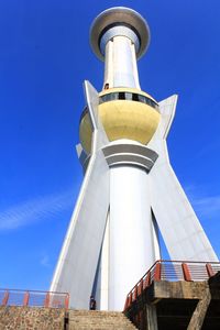 Low angle view of building against blue sky