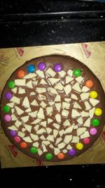 High angle view of multi colored candies on table