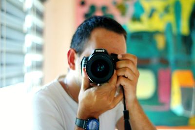 Portrait of man photographing