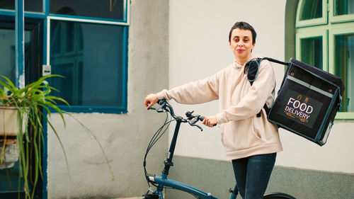 Portrait of young man using mobile phone